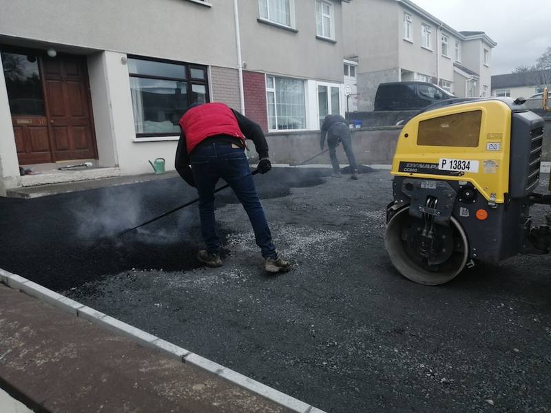 Ardnore: raking in front of the house with the roller beside